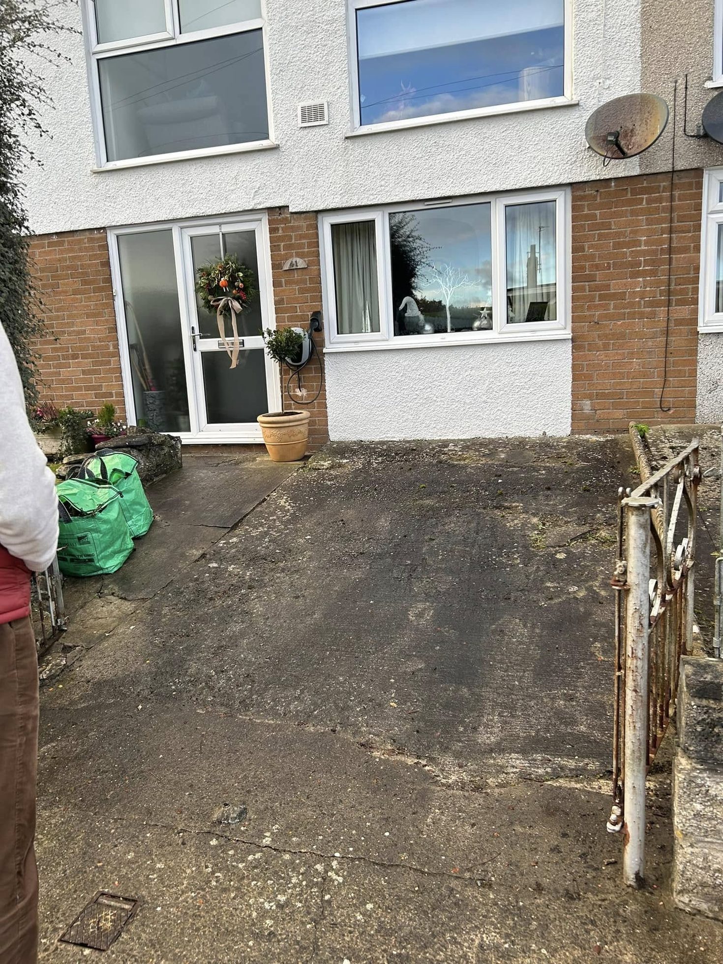 Cracked concrete driveway before block paving work in South Wales
