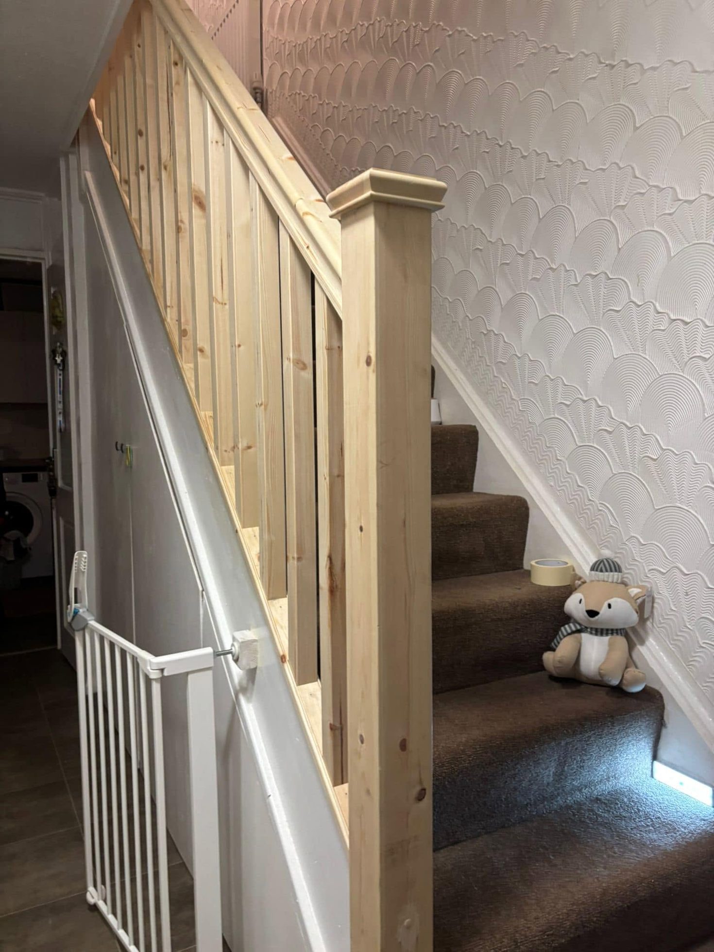 New timber staircase newel post, spindles and handrail after fitting