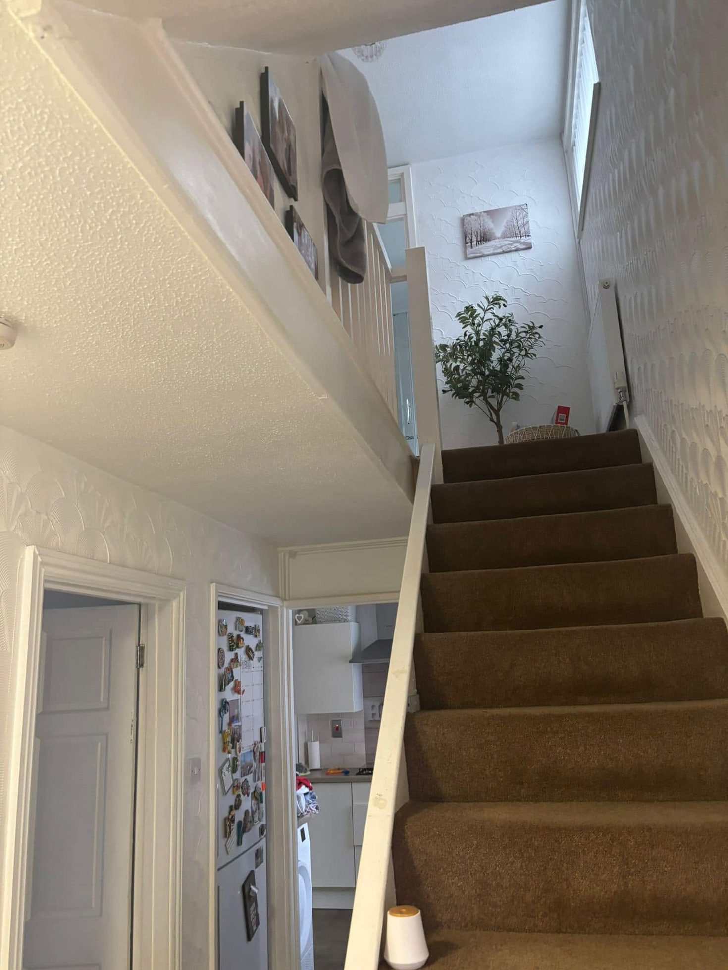 Dated white painted staircase balustrade before joinery work